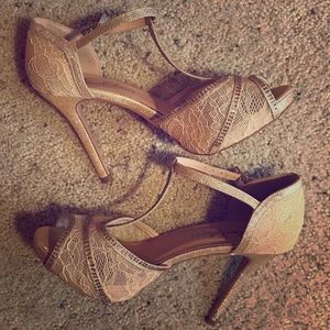 Peep-toe De Blossom pumps w/ ankle strap.